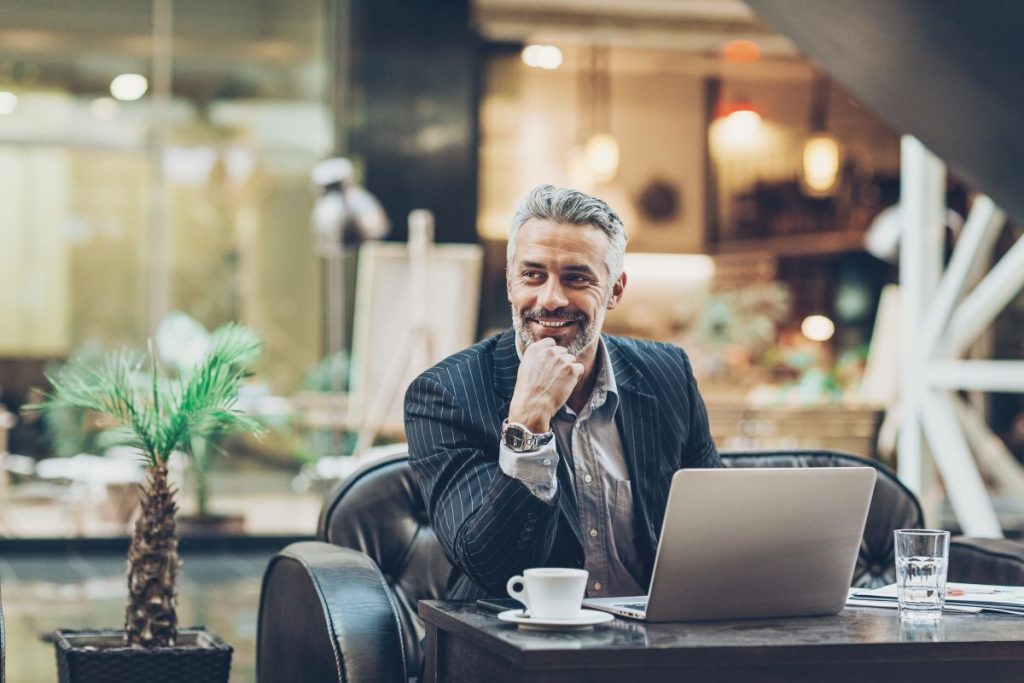 Man sitting at desk with computer