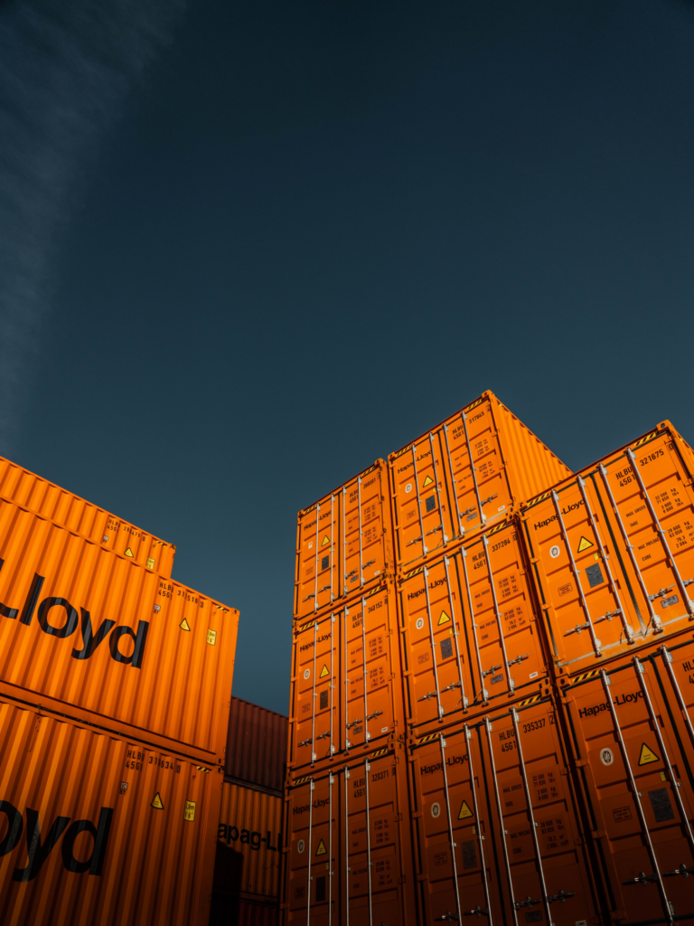 A shipment of cargo containers waiting to be picked up. 